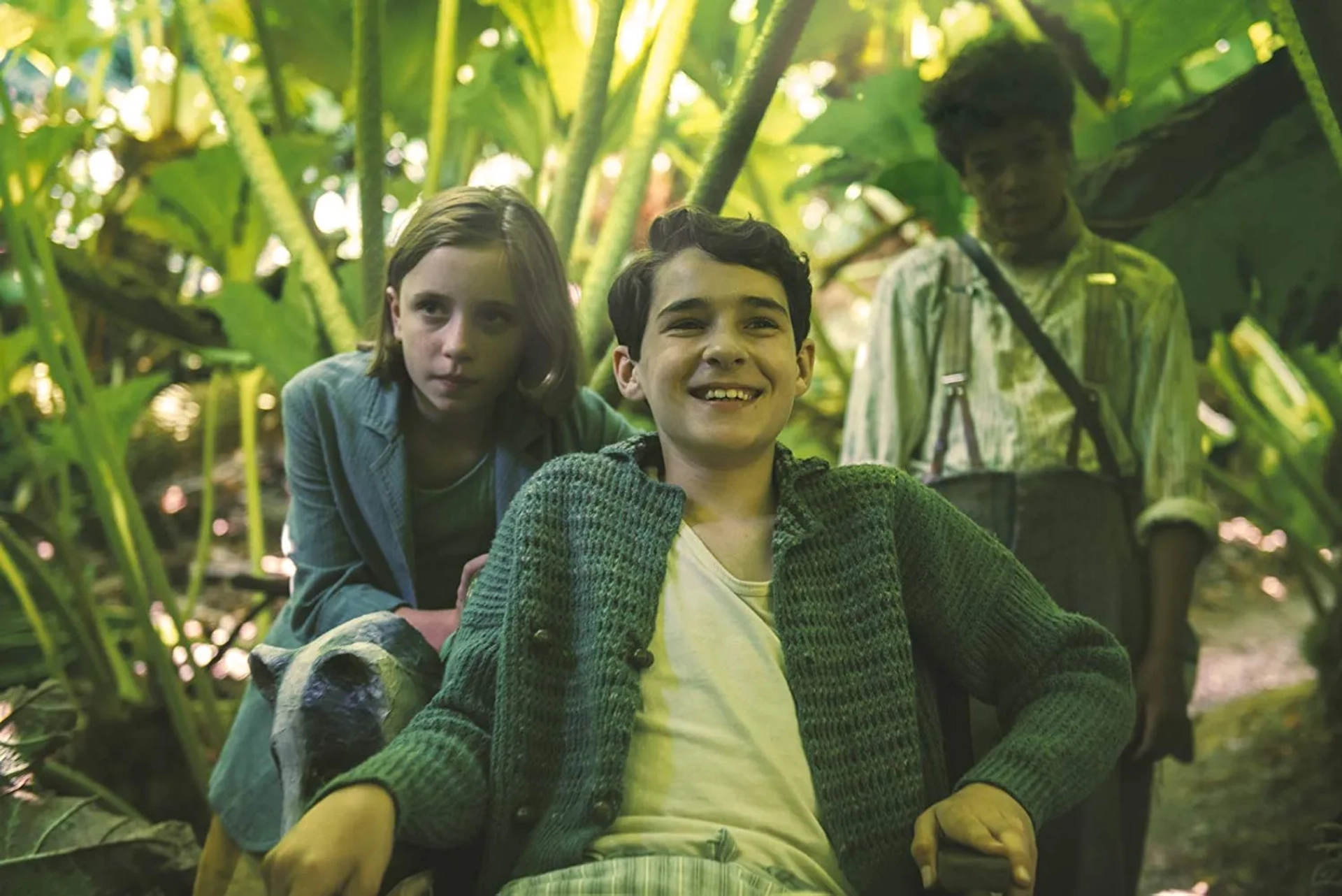 Dixie Egerickx, Edan Hayhurst, and Amir Wilson in The Secret Garden (2020)