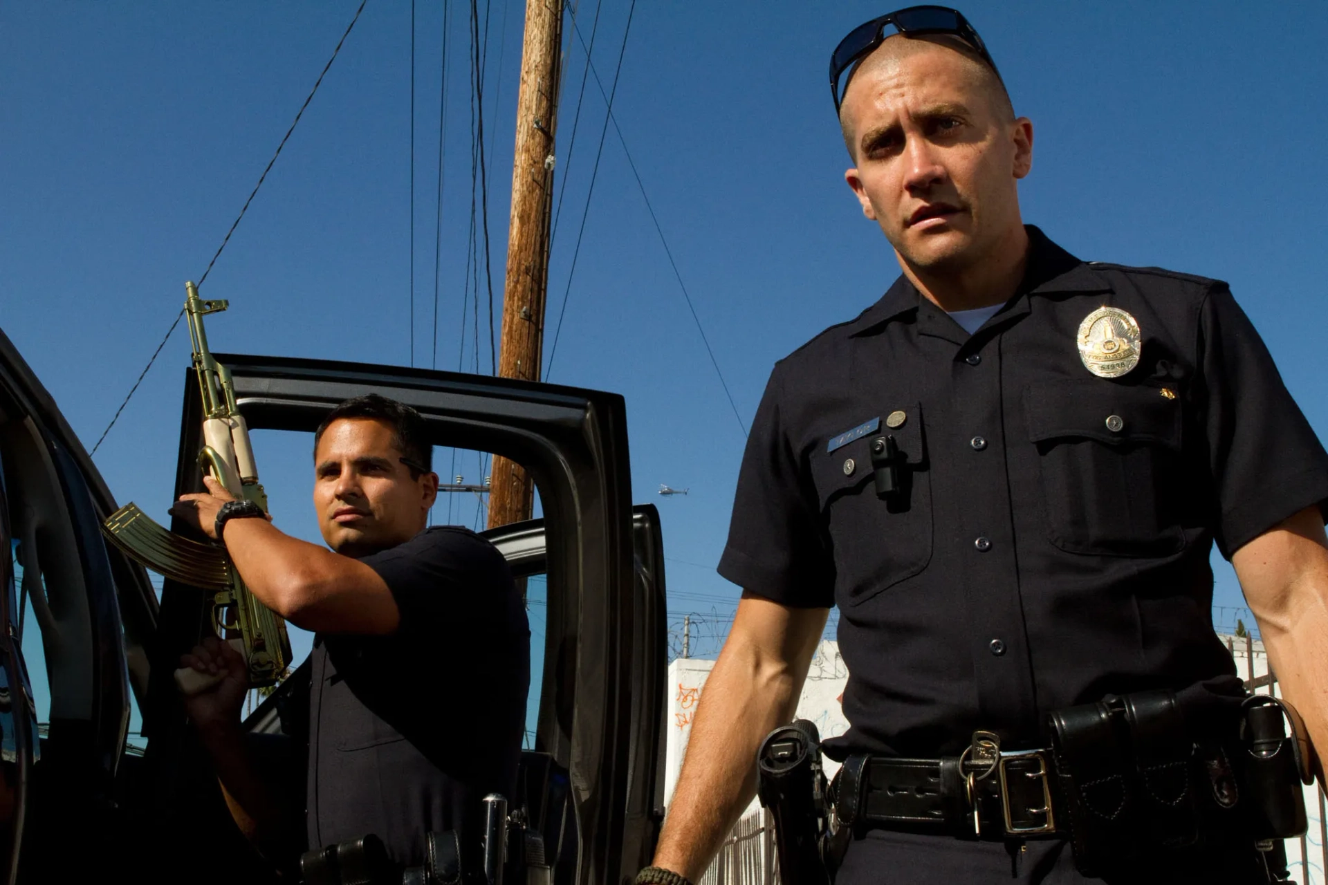 Jake Gyllenhaal and Michael Peña in End of Watch (2012)