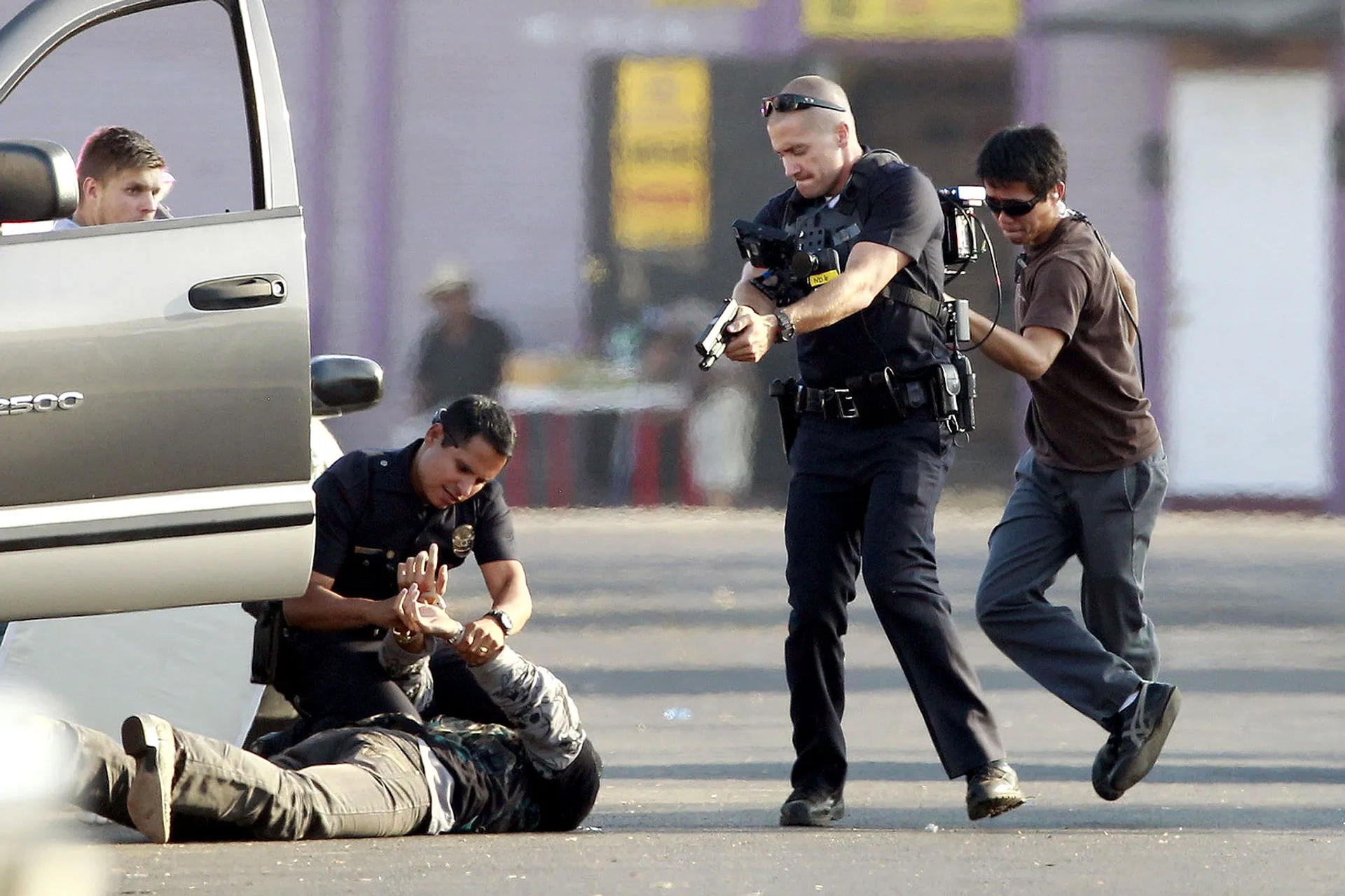 Jake Gyllenhaal and Michael Peña in End of Watch (2012)