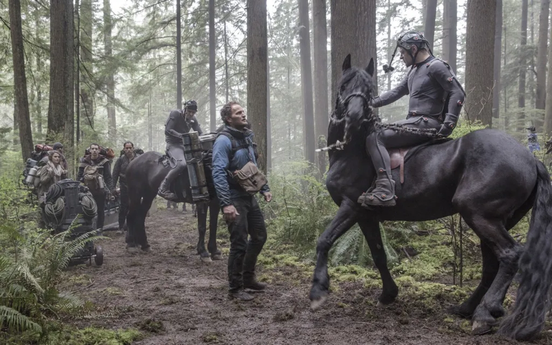 Keri Russell, Enrique Murciano, Jason Clarke, Andy Serkis, Jon Eyez, Toby Kebbell, and Kodi Smit-McPhee in Dawn of the Planet of the Apes (2014)