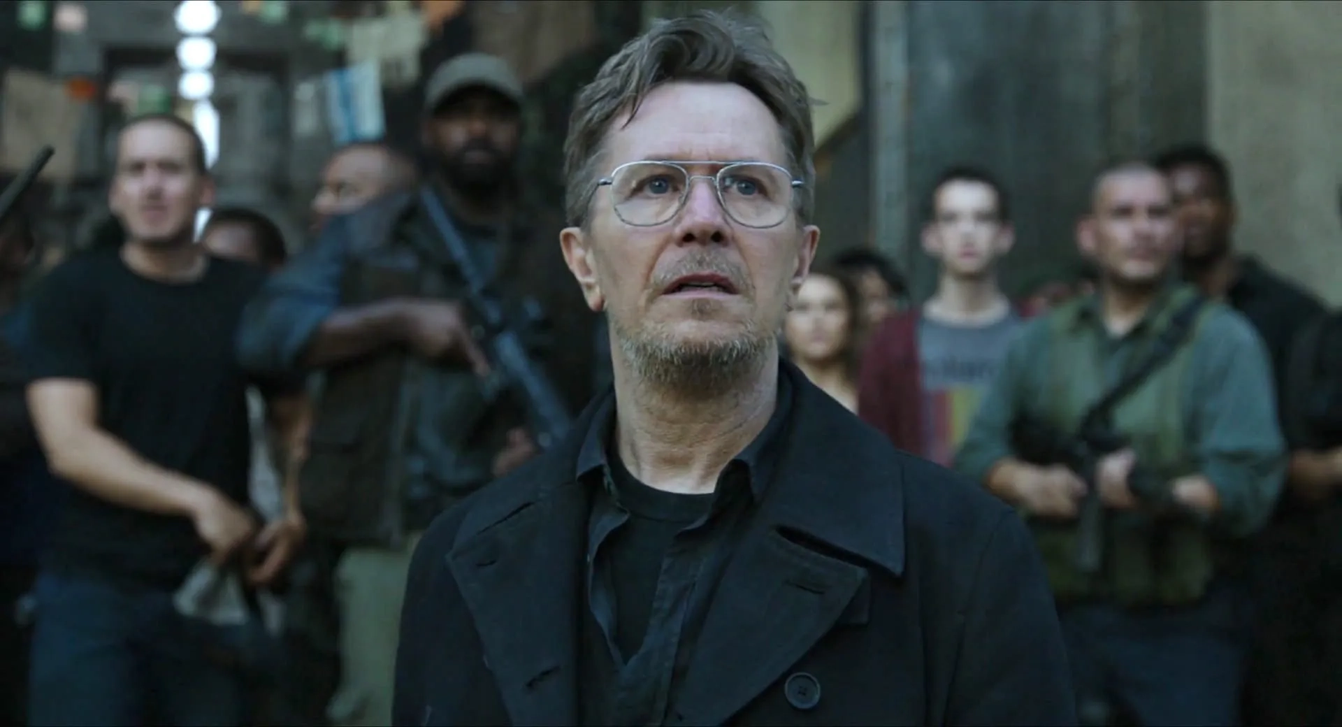 Gary Oldman, Keri Russell, and Kodi Smit-McPhee in Dawn of the Planet of the Apes (2014)