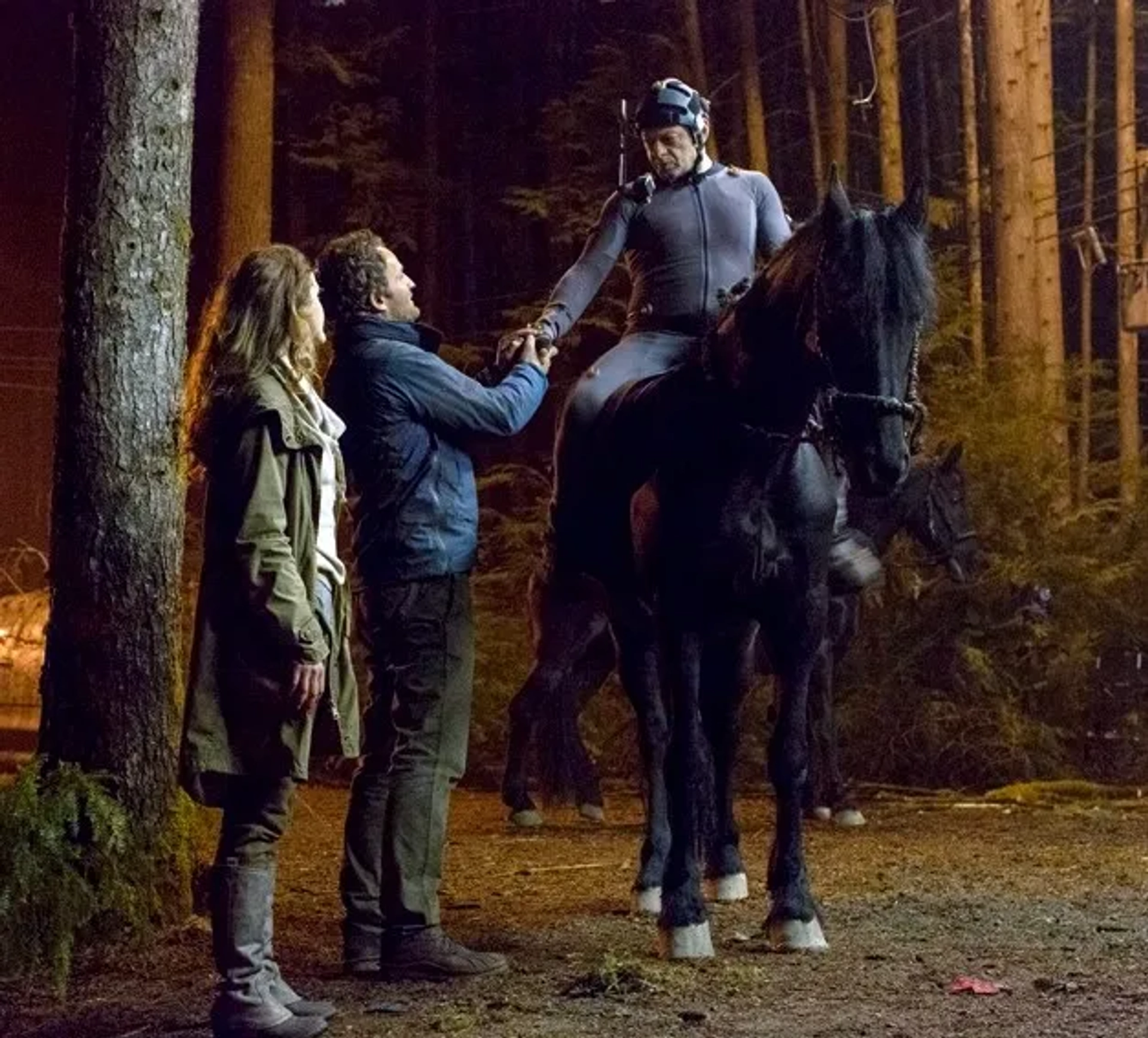 Keri Russell, Jason Clarke, and Andy Serkis in Dawn of the Planet of the Apes (2014)