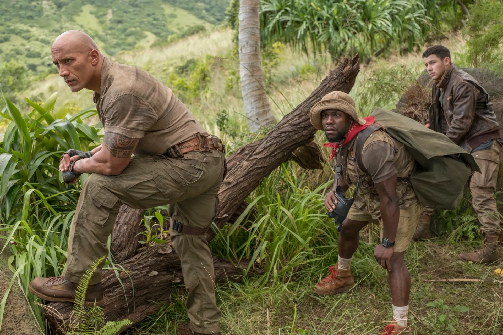 Kevin Hart, Dwayne Johnson, and Nick Jonas in Jumanji: Welcome to the Jungle (2017)