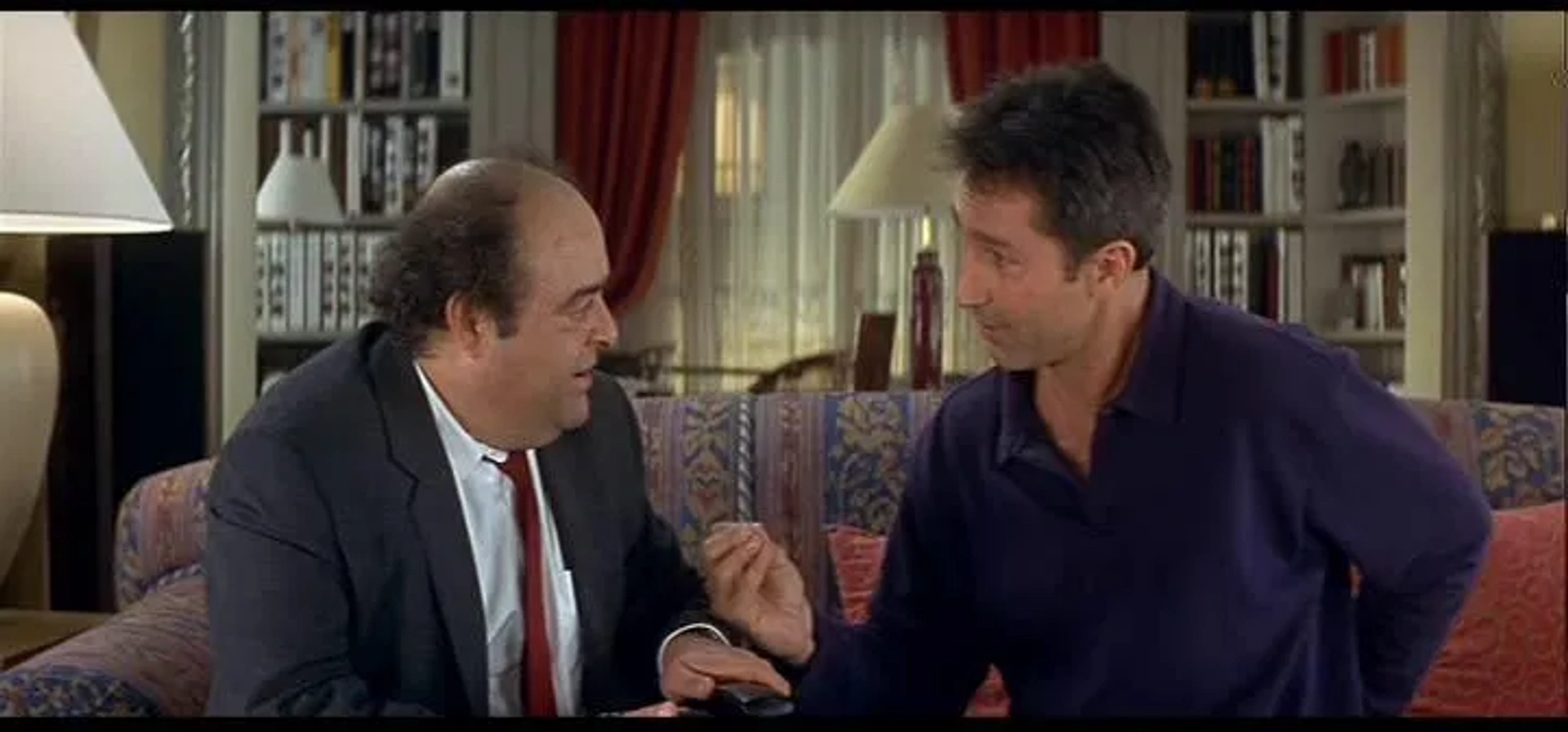 Thierry Lhermitte and Jacques Villeret in Le Dîner de Cons (1998)