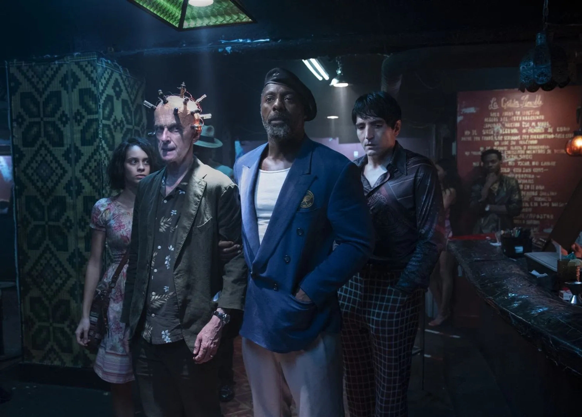 Peter Capaldi, Idris Elba, David Dastmalchian, and Daniela Melchior in The Suicide Squad (2021)