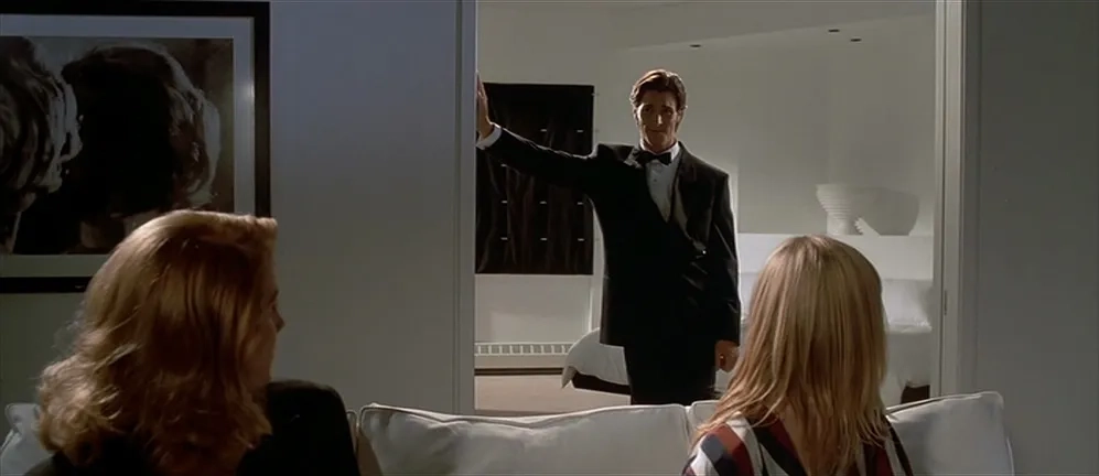 Christian Bale, Cara Seymour, and Krista Sutton in American Psycho (2000)