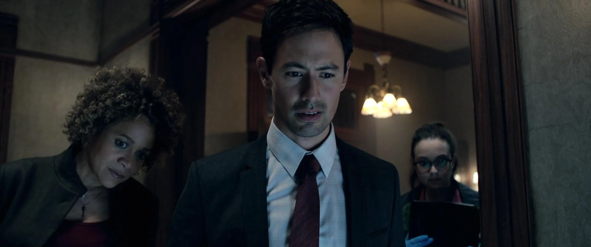 Michole Briana White, Ingrid Bisu, and George Young in Malignant (2021)