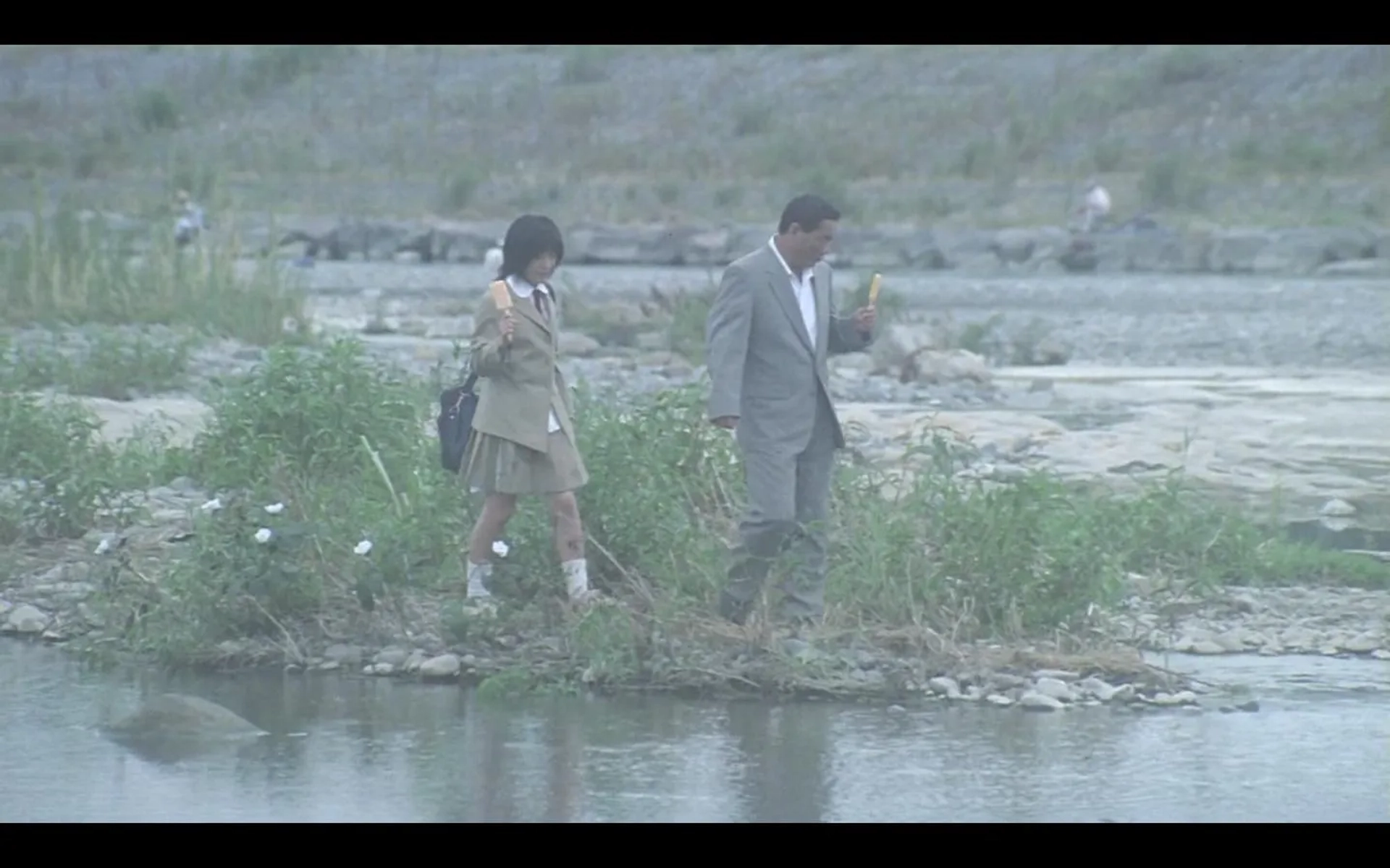 Takeshi Kitano and Aki Maeda in Battle Royale (2000)