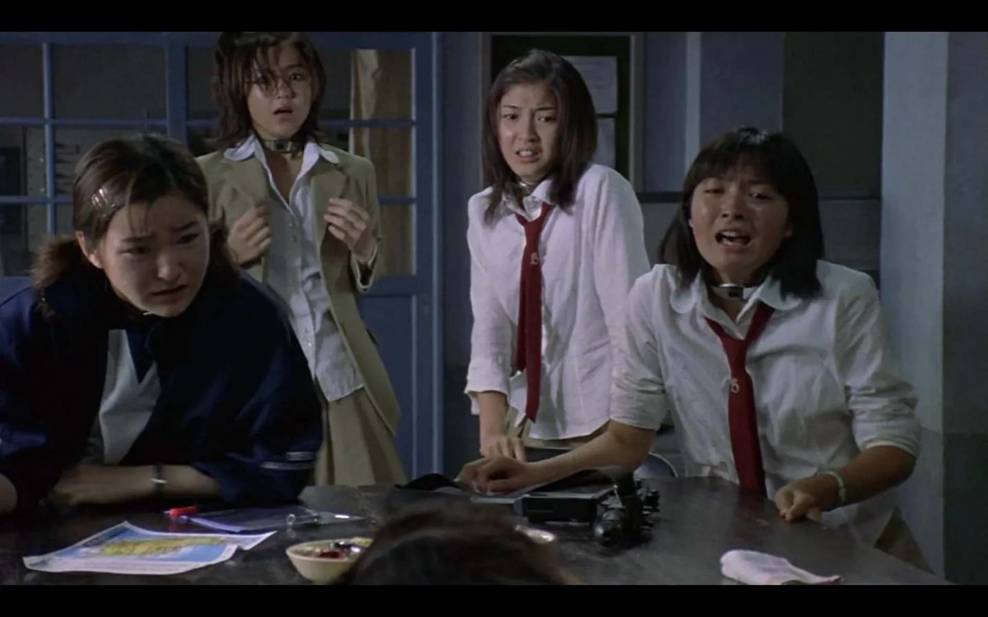 Asami Kanai and Sayaka Kamiya in Battle Royale (2000)