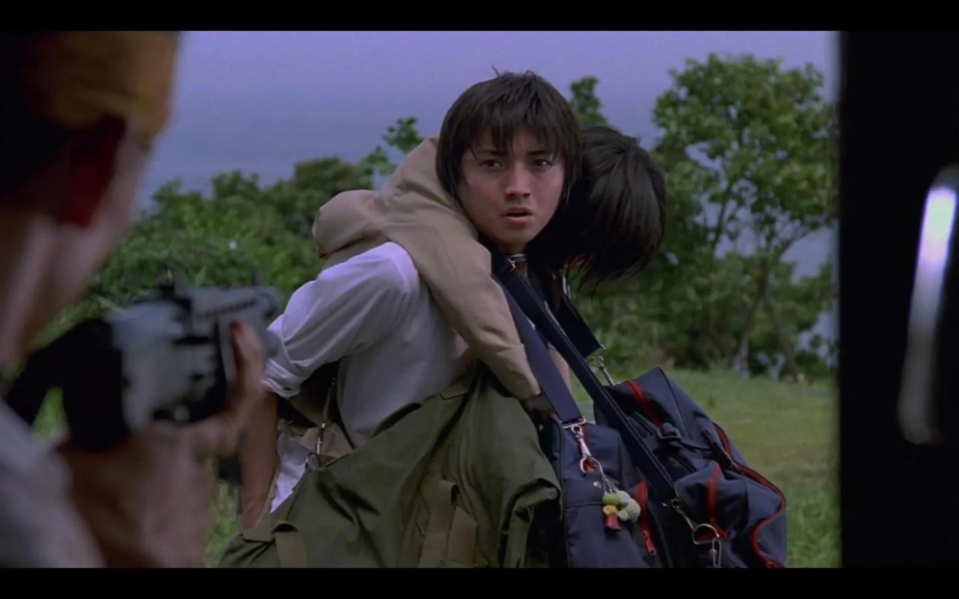 Tatsuya Fujiwara, Aki Maeda, and Tarô Yamamoto in Battle Royale (2000)