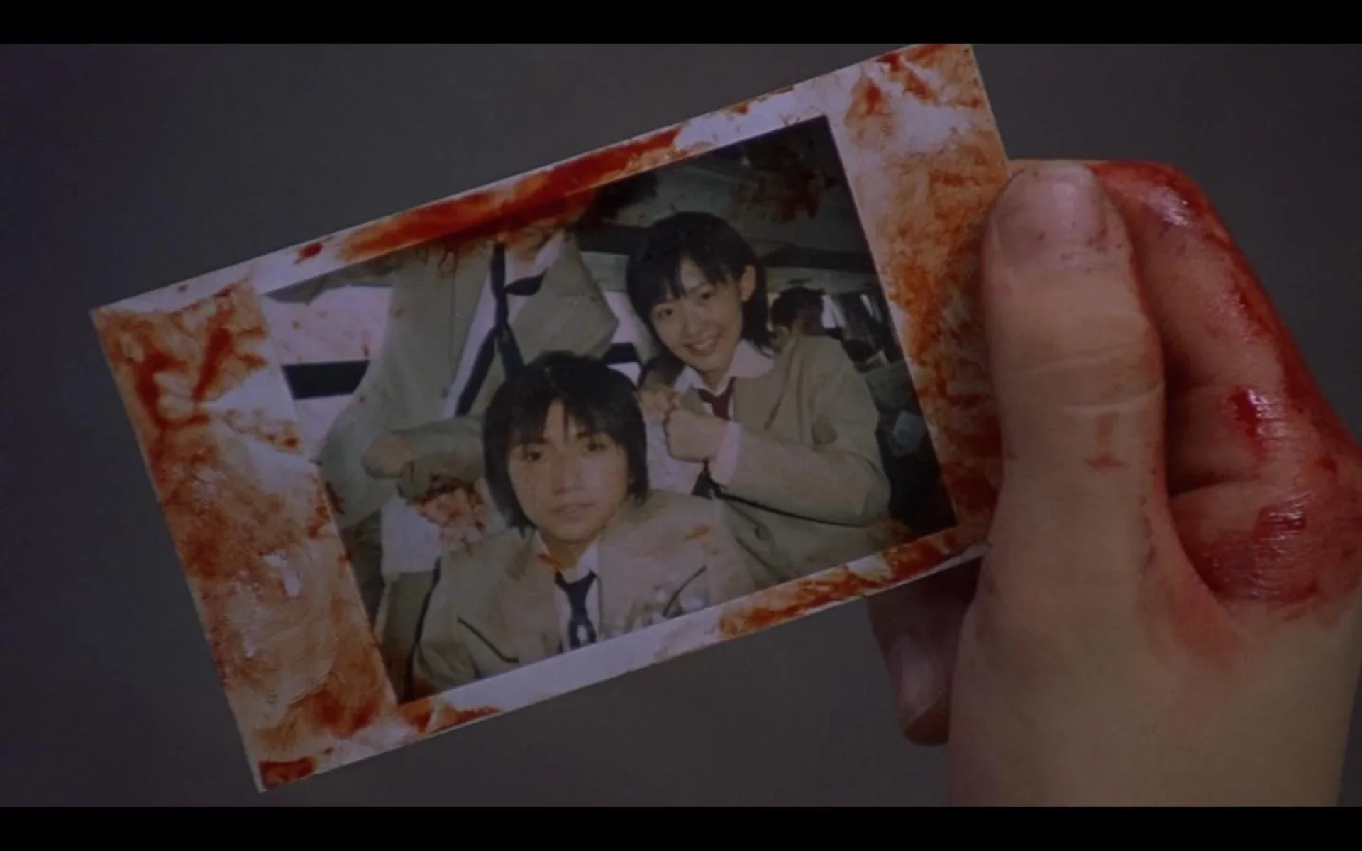 Tatsuya Fujiwara, Aki Maeda, and Yukihiro Kotani in Battle Royale (2000)