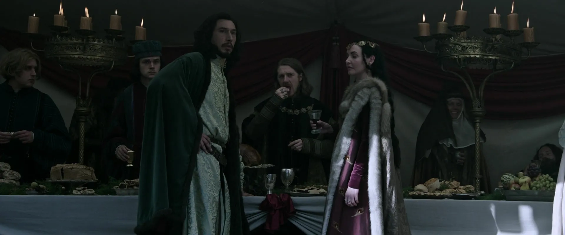 Adam Nagaitis, Caoimhe O'Malley, and Adam Driver in The Last Duel (2021)