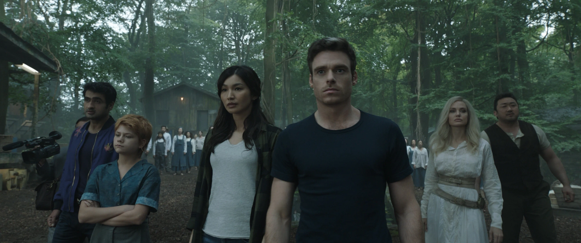 Angelina Jolie, Richard Madden, Harish Patel, Gemma Chan, Ma Dong-seok, Kumail Nanjiani, and Lia McHugh in Eternals (2021)