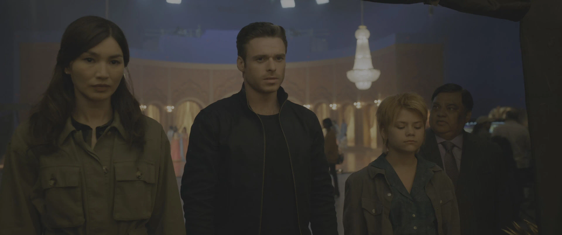 Richard Madden, Harish Patel, Gemma Chan, and Lia McHugh in Eternals (2021)