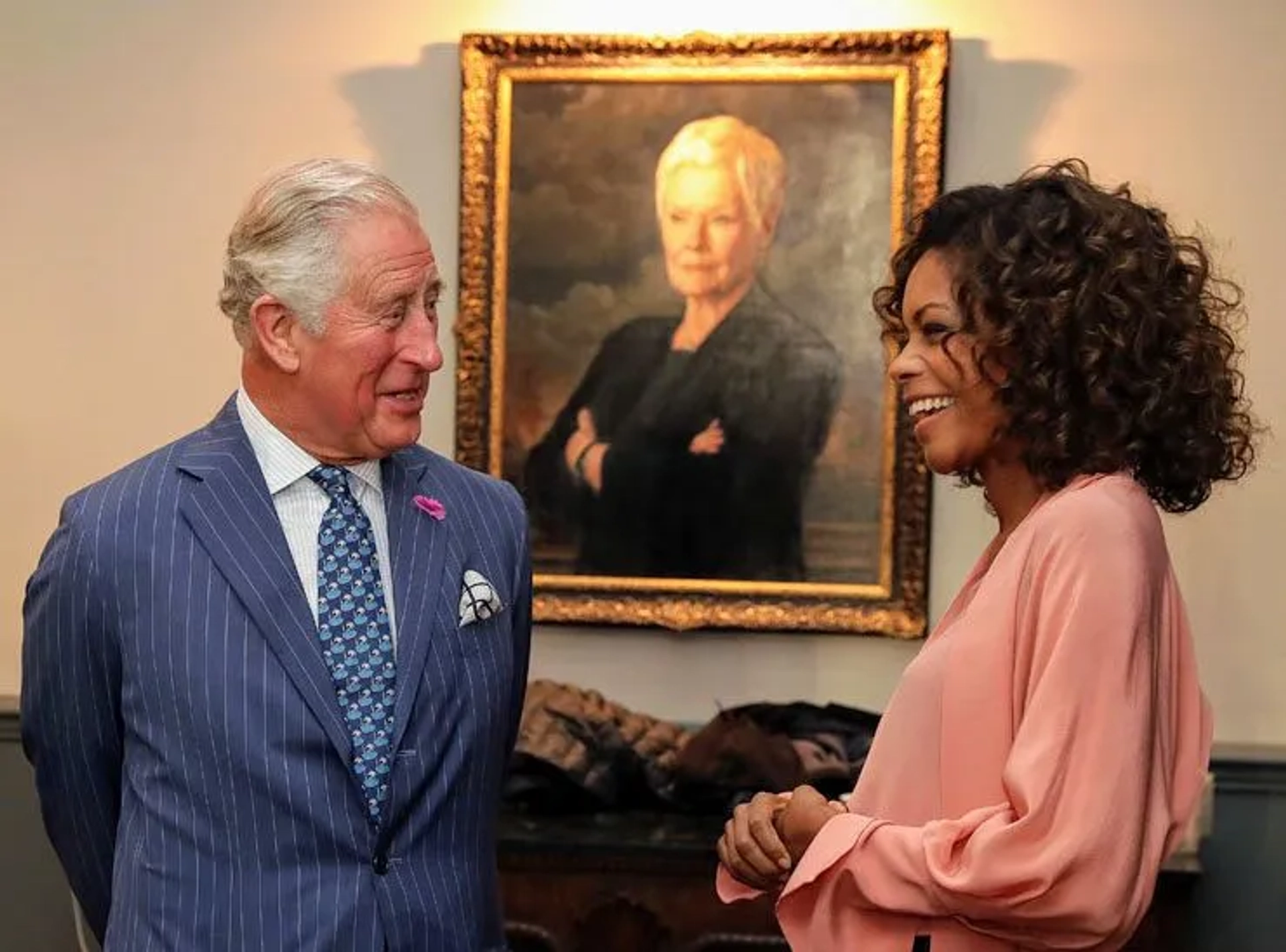 Naomie Harris and King Charles III in No Time to Die (2021)