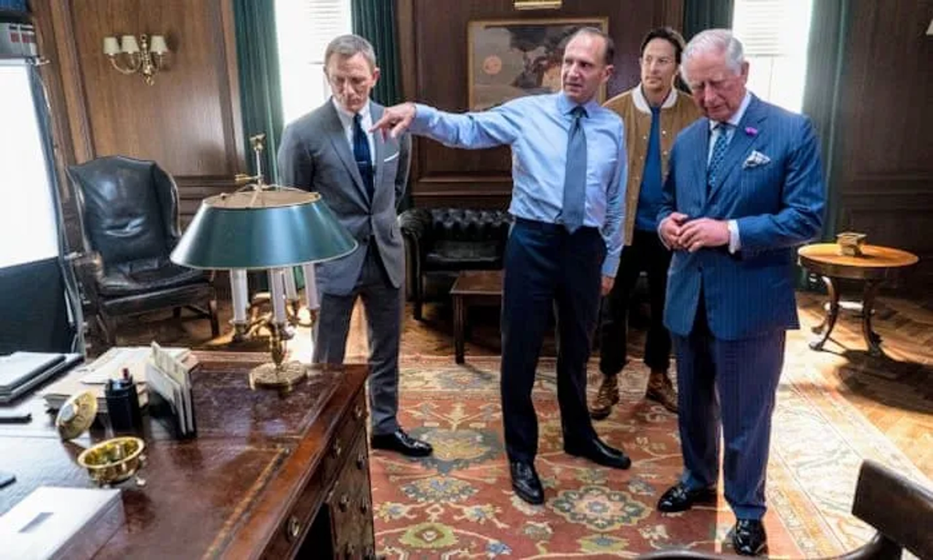 Ralph Fiennes, Daniel Craig, King Charles III, and Cary Joji Fukunaga in No Time to Die (2021)