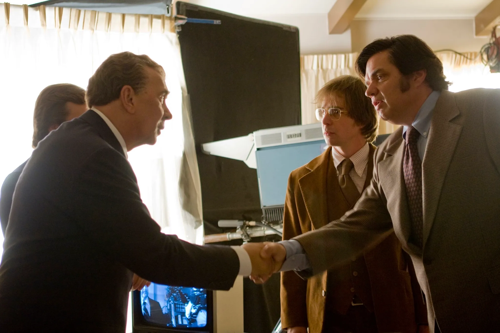 Frank Langella, Oliver Platt, and Sam Rockwell in Frost/Nixon (2008)