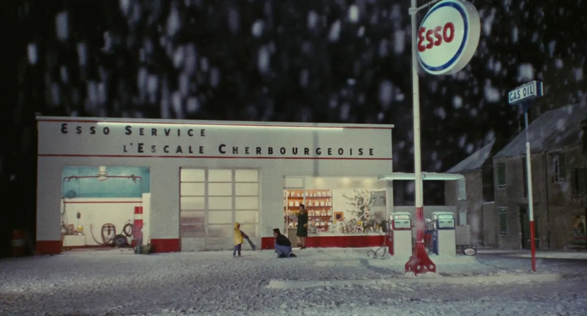 Nino Castelnuovo, Ellen Farner, and Hervé Legrand in The Umbrellas of Cherbourg (1964)