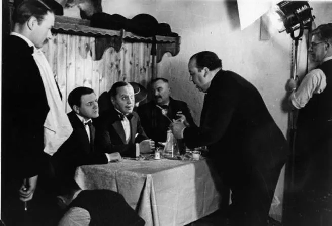 Alfred Hitchcock, Basil Radford, and Naunton Wayne in The Lady Vanishes (1938)