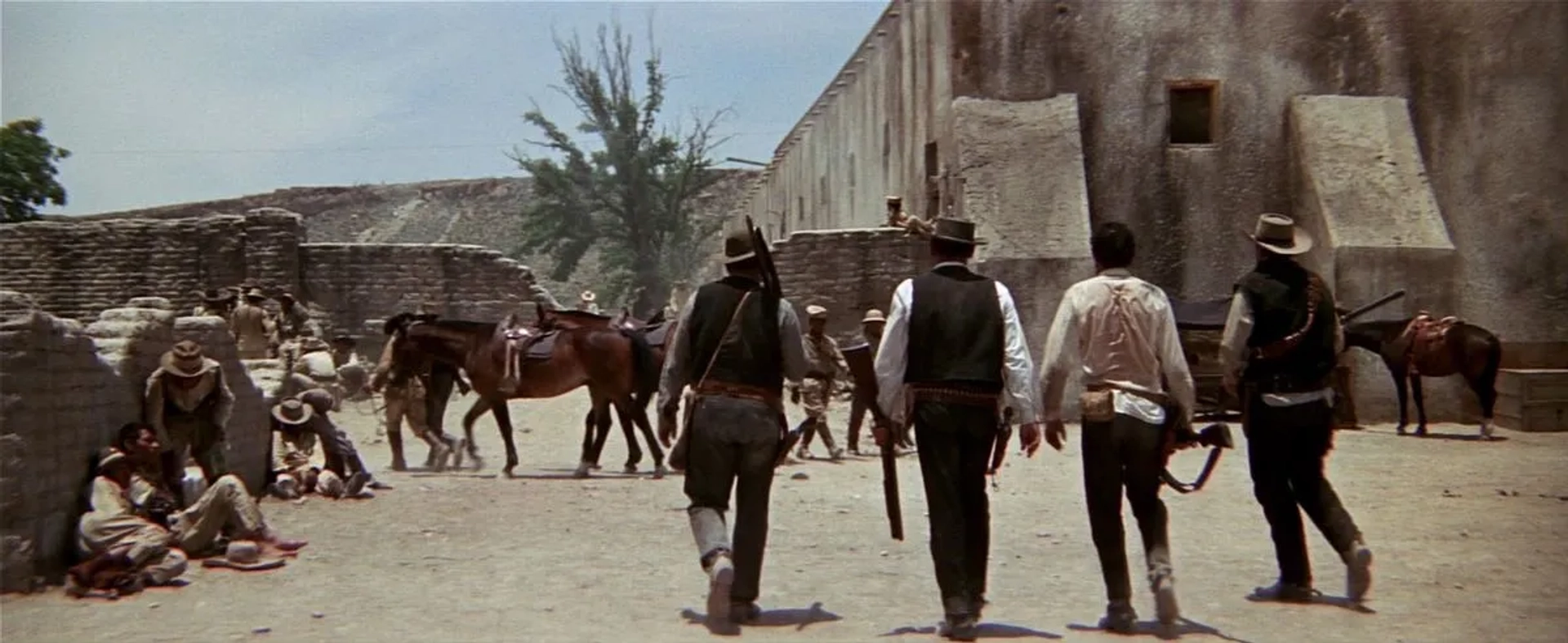 William Holden, Ernest Borgnine, Ben Johnson, and Warren Oates in The Wild Bunch (1969)