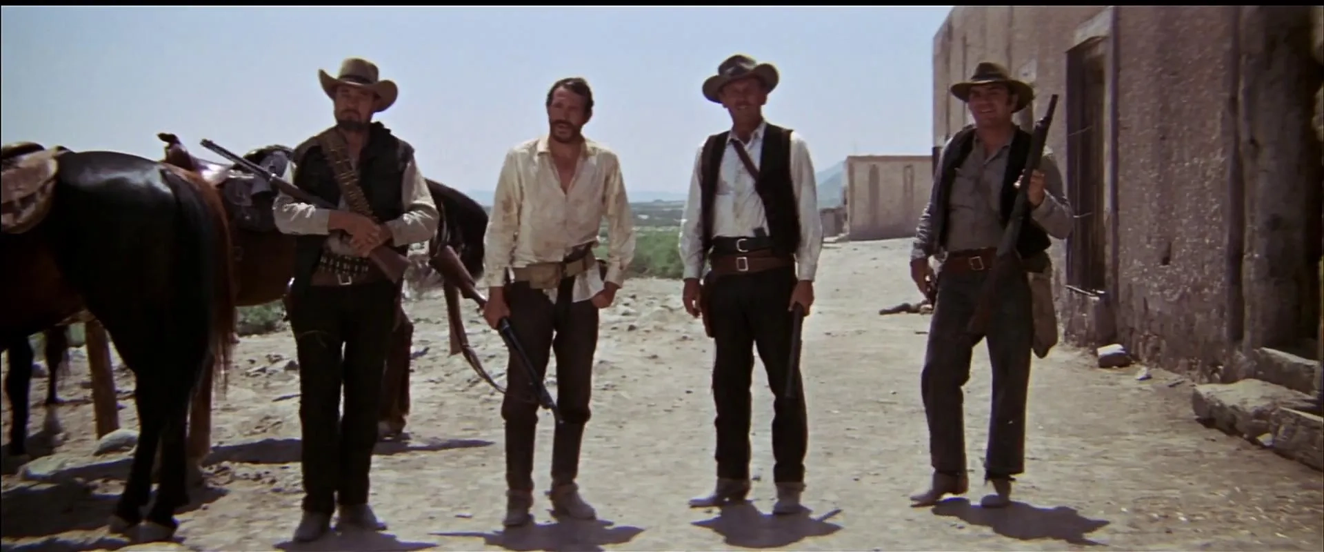 William Holden, Ernest Borgnine, Ben Johnson, and Warren Oates in The Wild Bunch (1969)