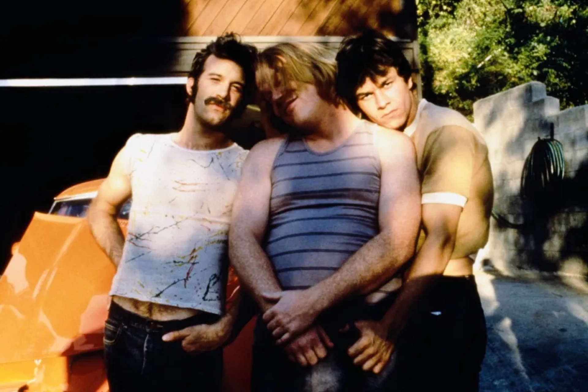 Mark Wahlberg, Philip Seymour Hoffman, and Thomas Jane in Boogie Nights (1997)