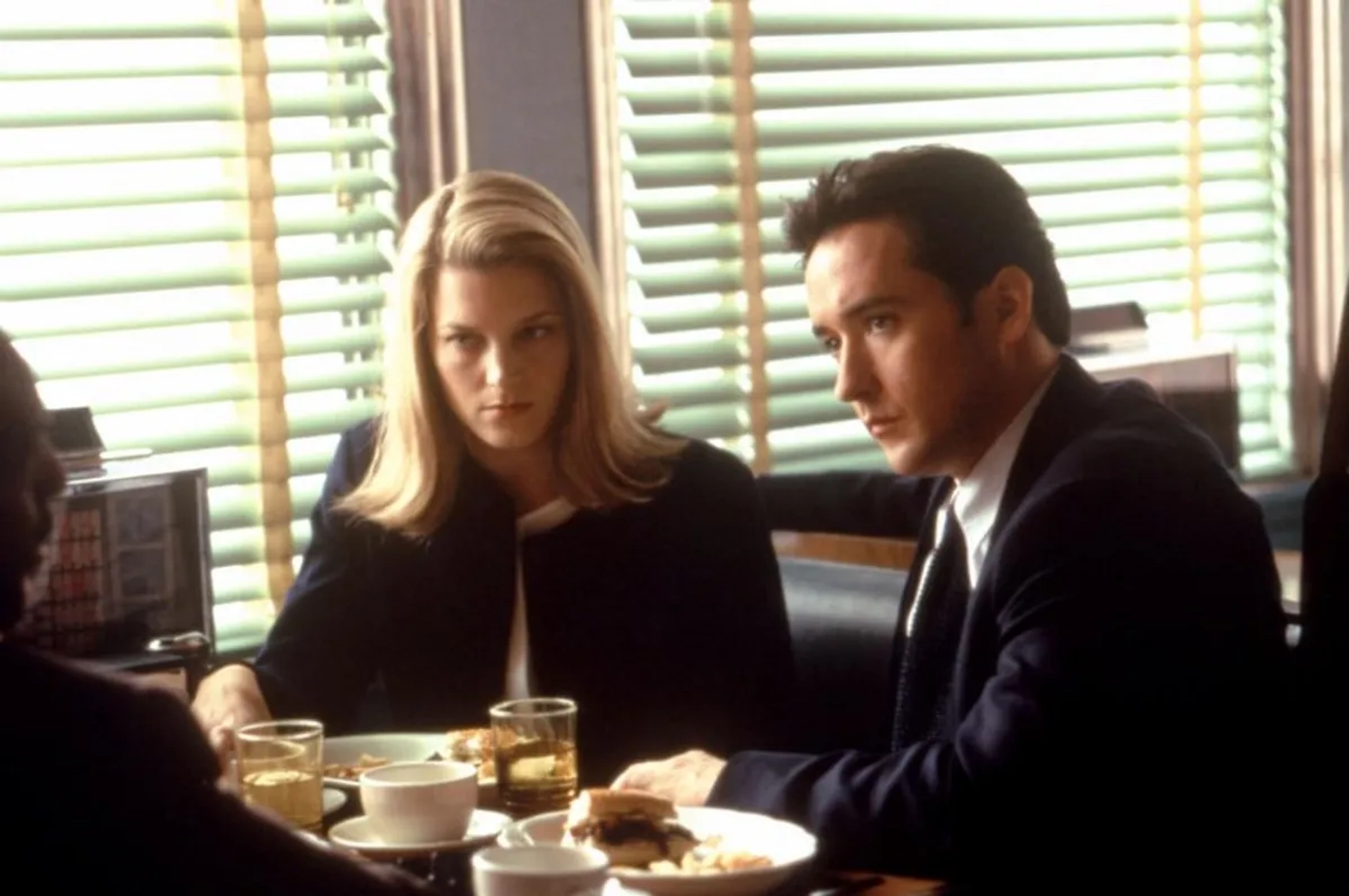 John Cusack and Bridget Fonda in City Hall (1996)