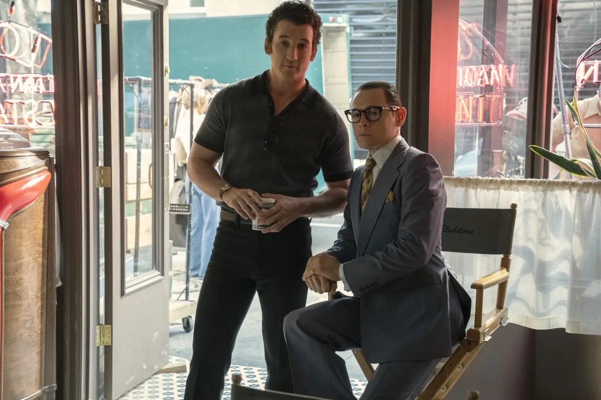 Burn Gorman and Miles Teller in The Offer (2022)
