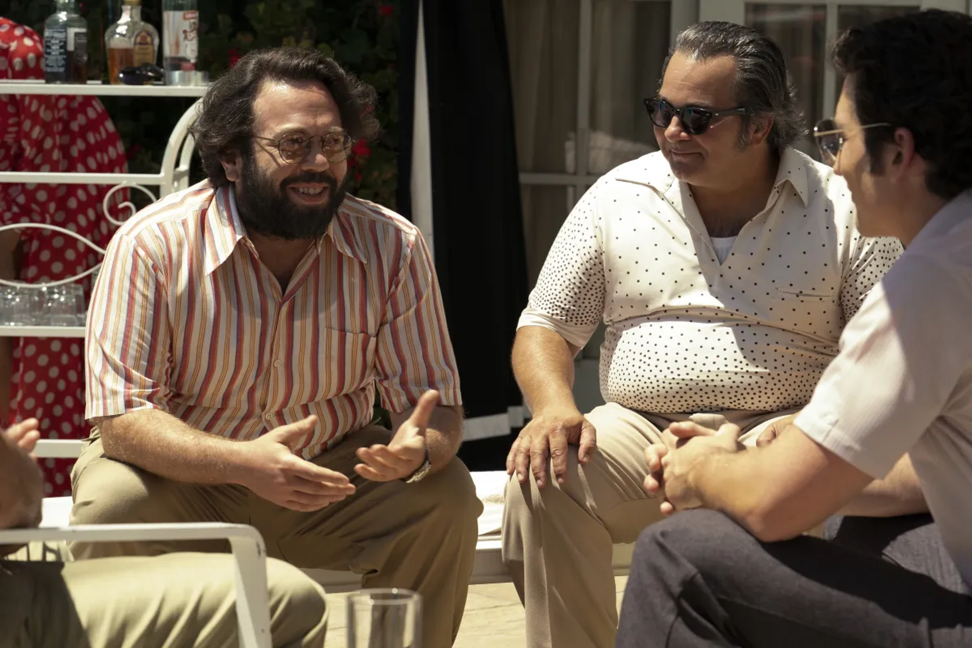 Dan Fogler, Patrick Gallo, and Miles Teller in The Offer (2022)