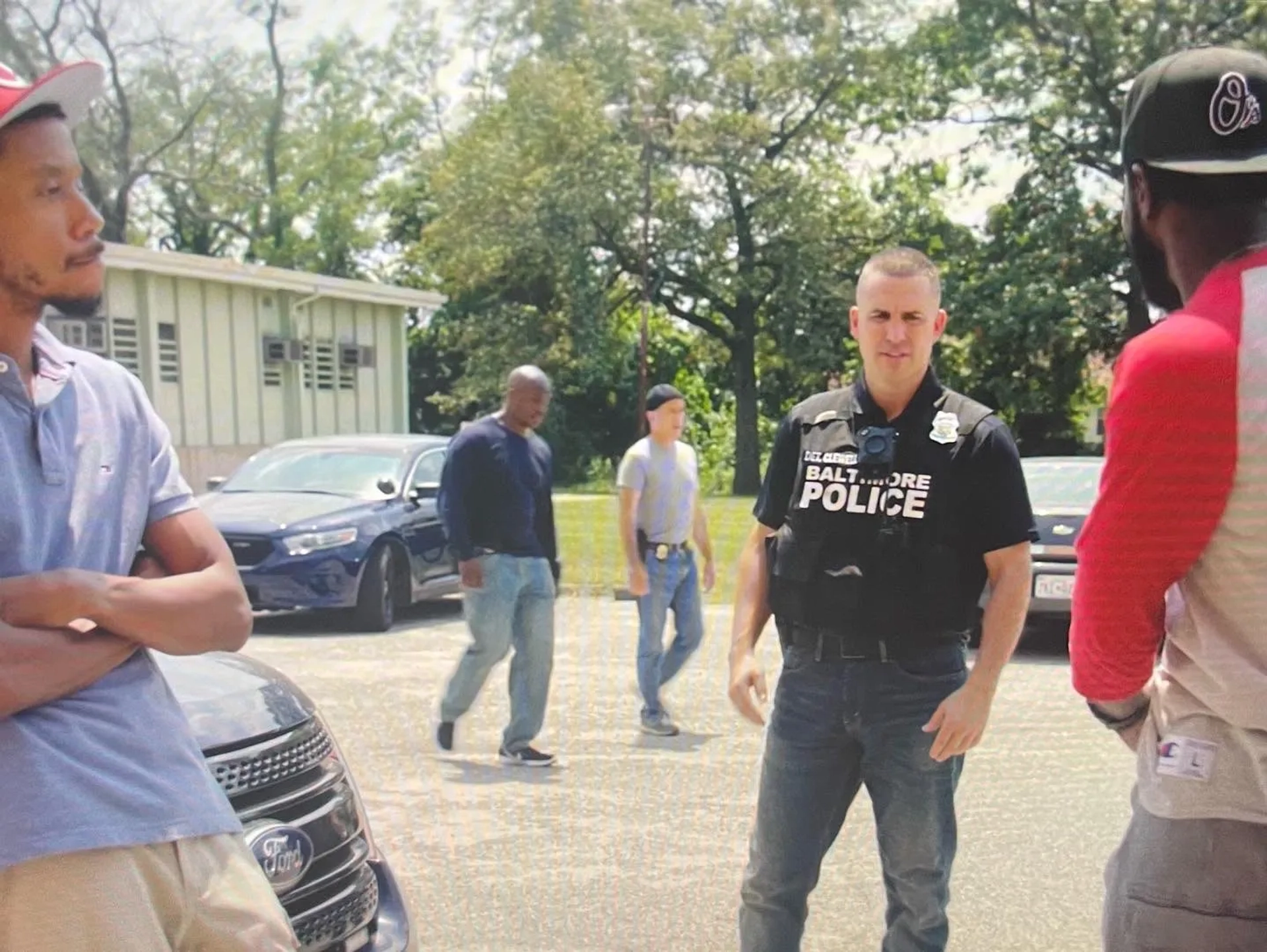 Victor Dobro, Darrell Britt-Gibson, and McKinley Belcher III in We Own This City (2022)