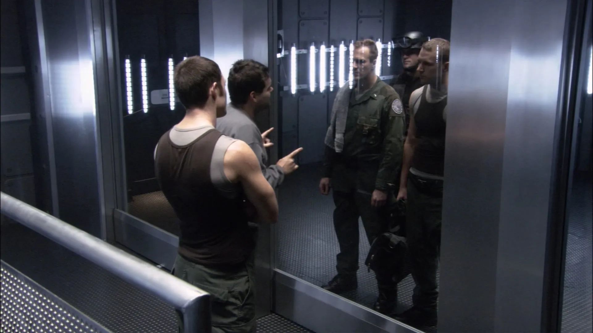 Derek Delost, Mike Dopud, Aaron Douglas, and Tahmoh Penikett in Battlestar Galactica (2004)