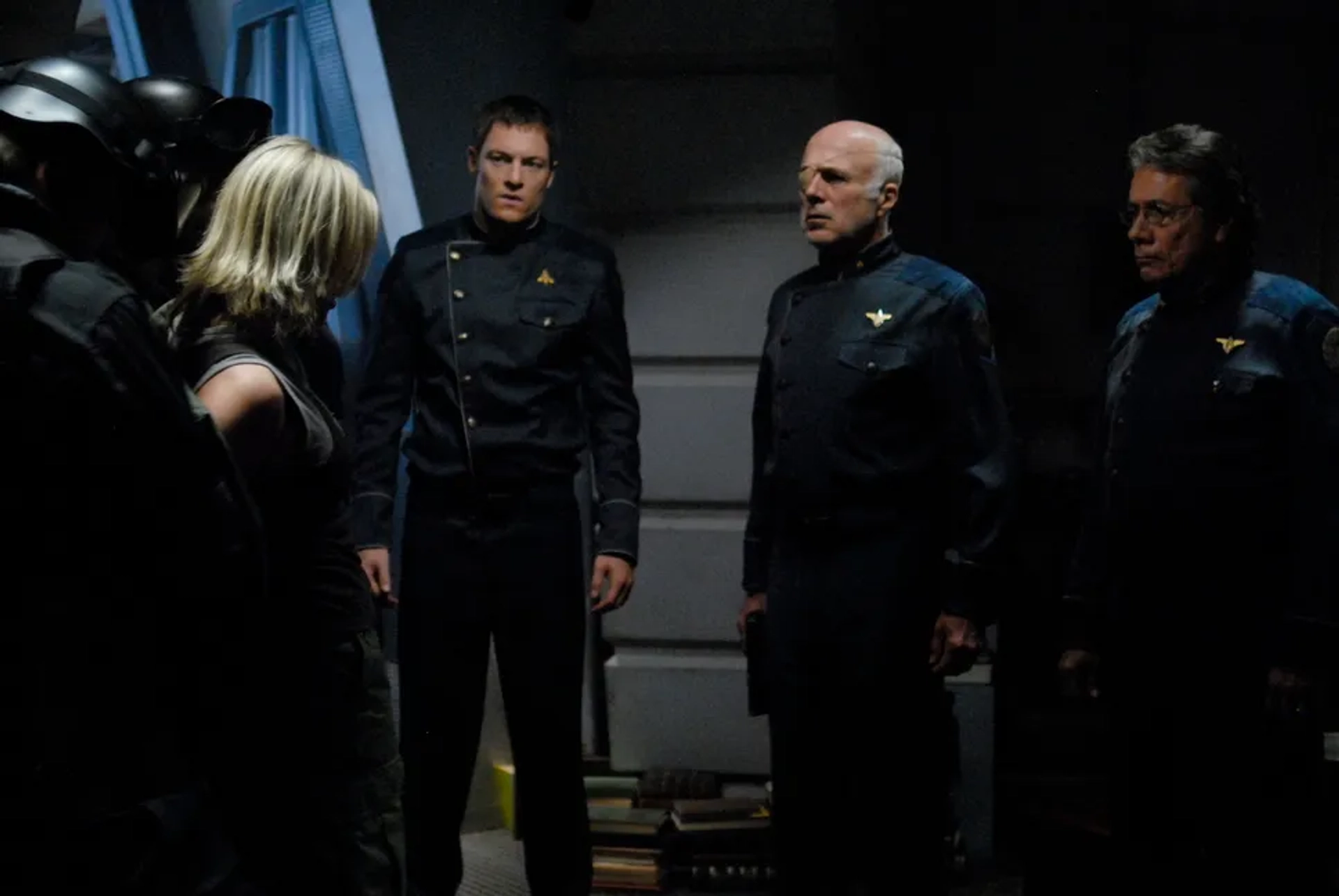 Edward James Olmos, Michael Hogan, Tahmoh Penikett, and Katee Sackhoff in Battlestar Galactica (2004)