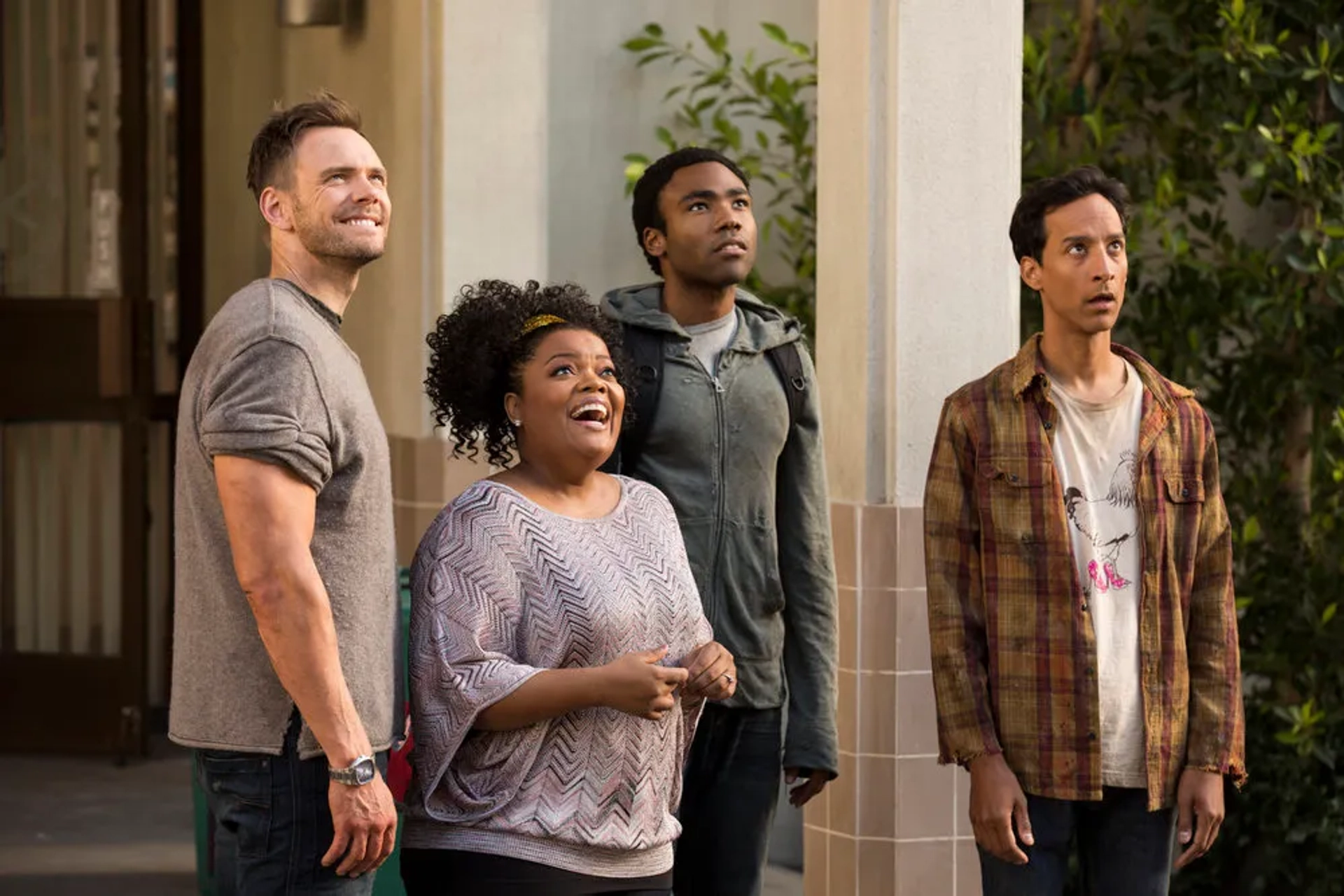 Joel McHale, Yvette Nicole Brown, Danny Pudi, and Donald Glover in Community (2009)