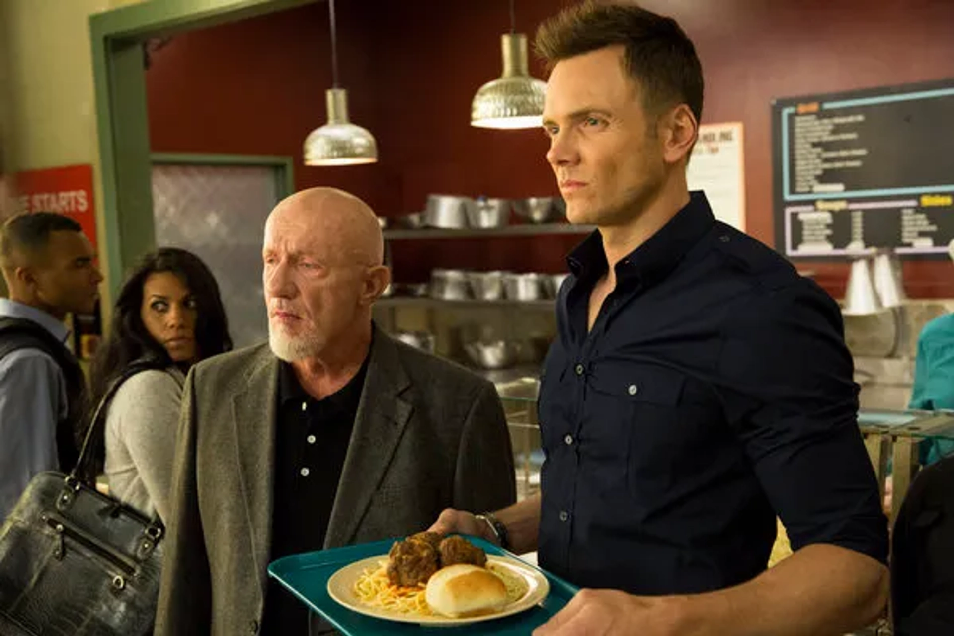 Jonathan Banks and Joel McHale in Community (2009)