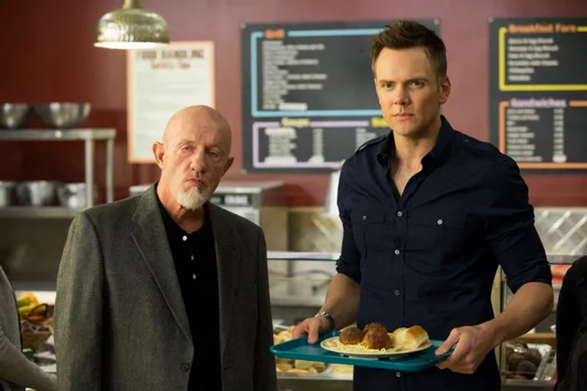 Jonathan Banks and Joel McHale in Community (2009)