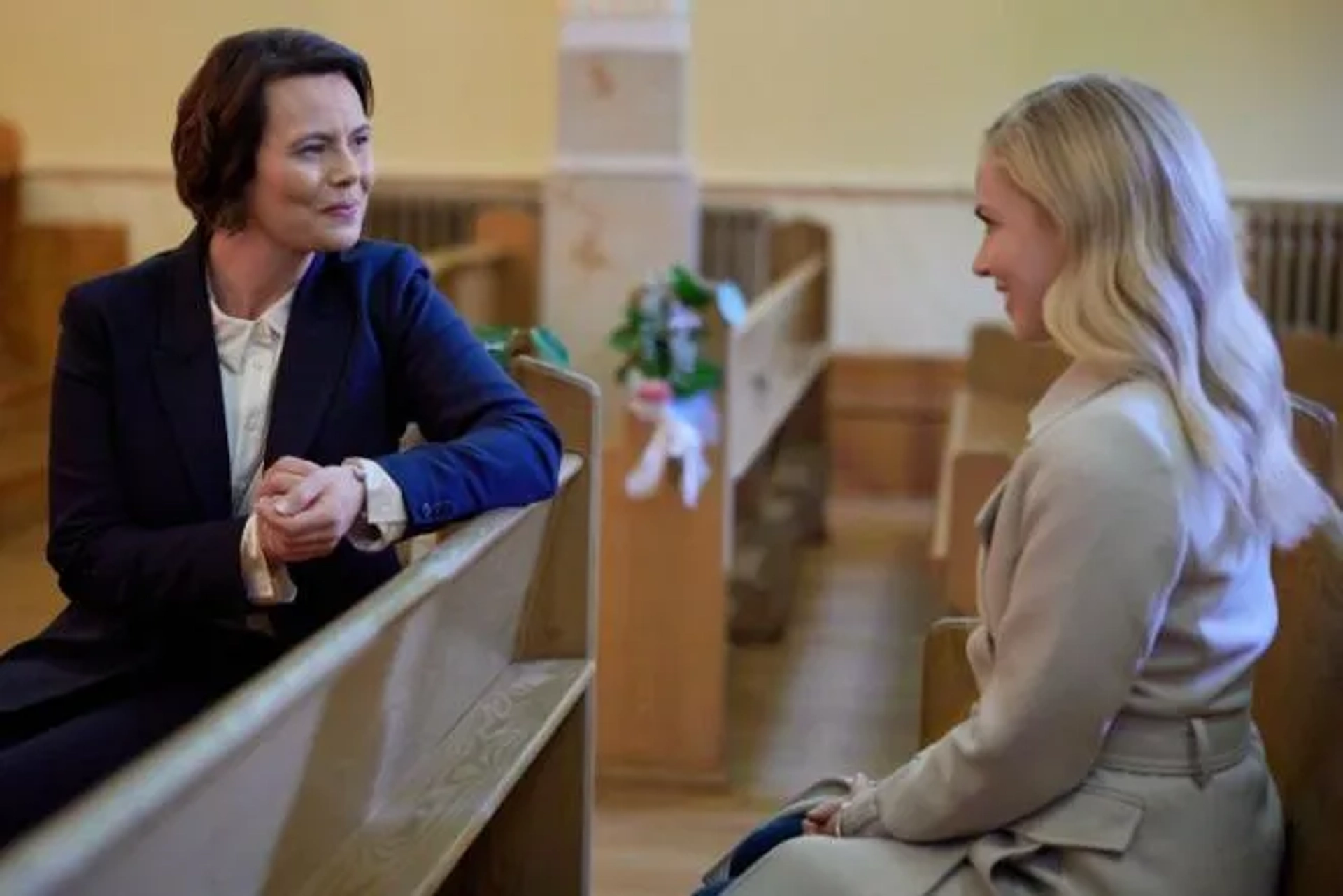 Amanda Schull and Corina Akeson in The Blessing Bracelet (2023)