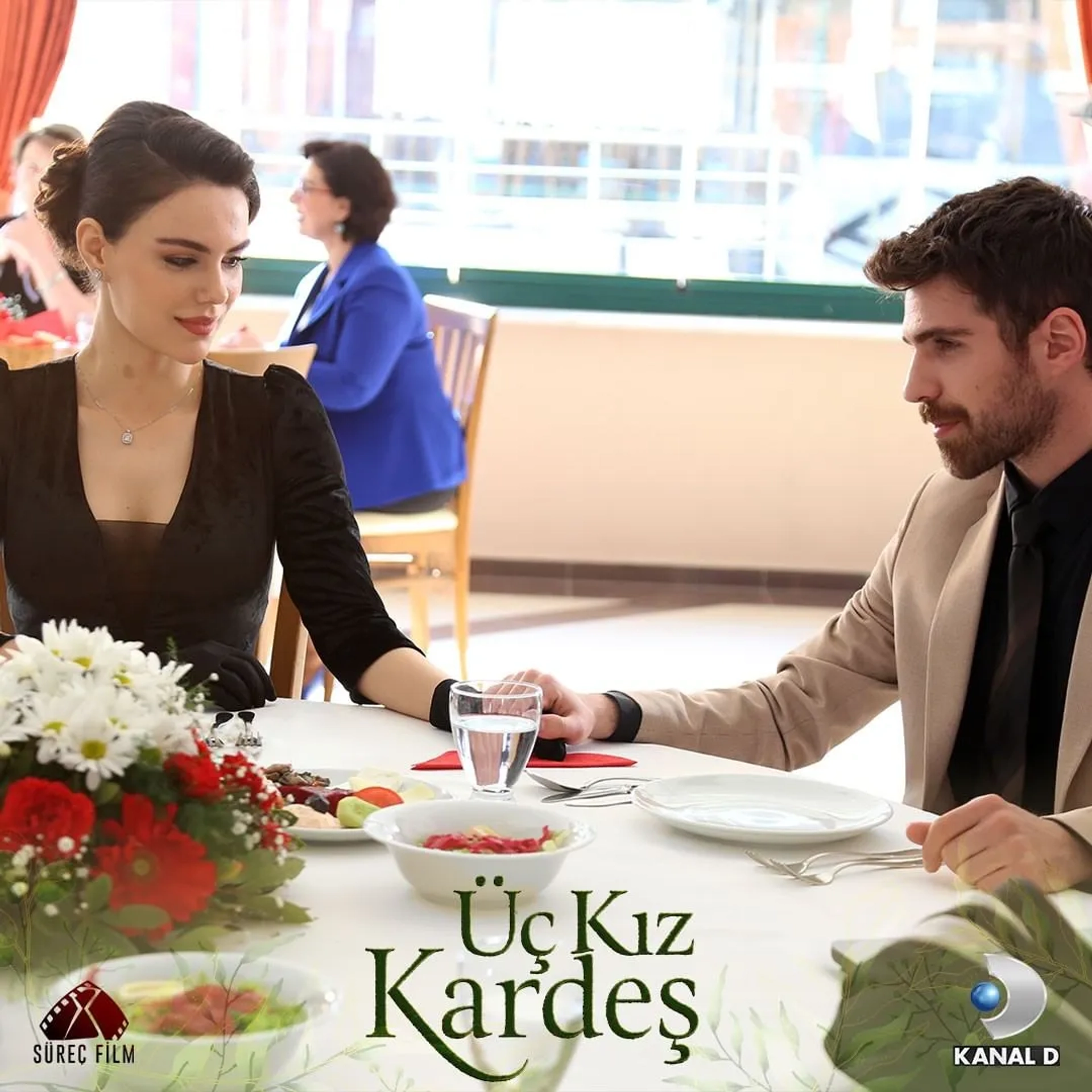 Berker Güven and Özgü Kaya in Three Sisters (2022)