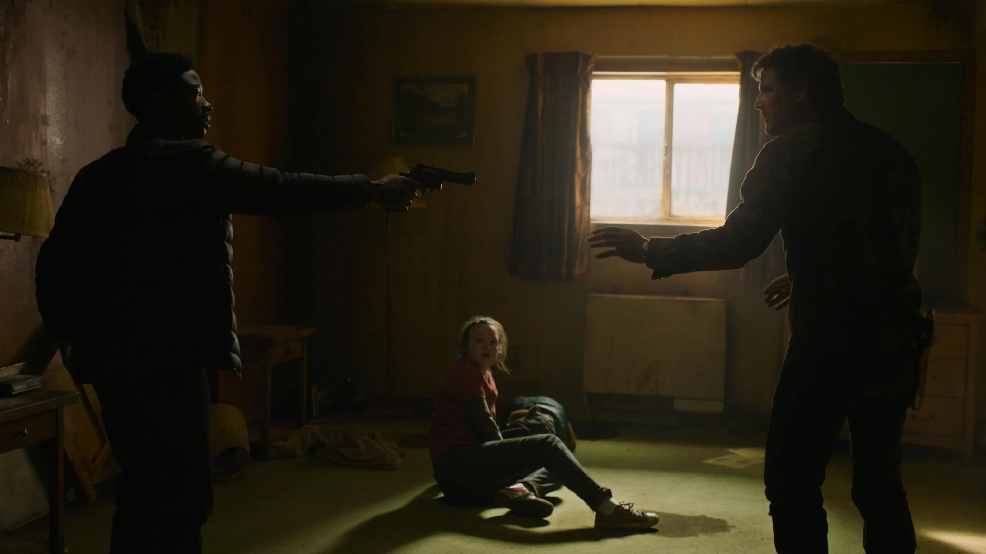 Pedro Pascal, Lamar Johnson, and Bella Ramsey in The Last of Us: Endure and Survive (2023)