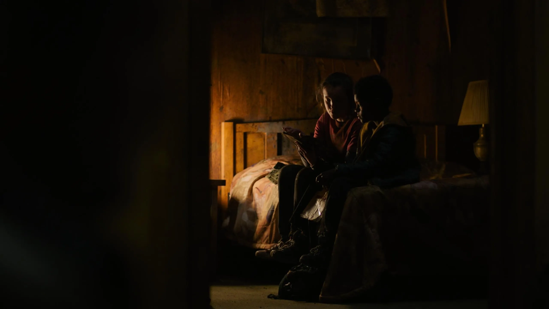 Keivonn Woodard and Bella Ramsey in The Last of Us: Endure and Survive (2023)