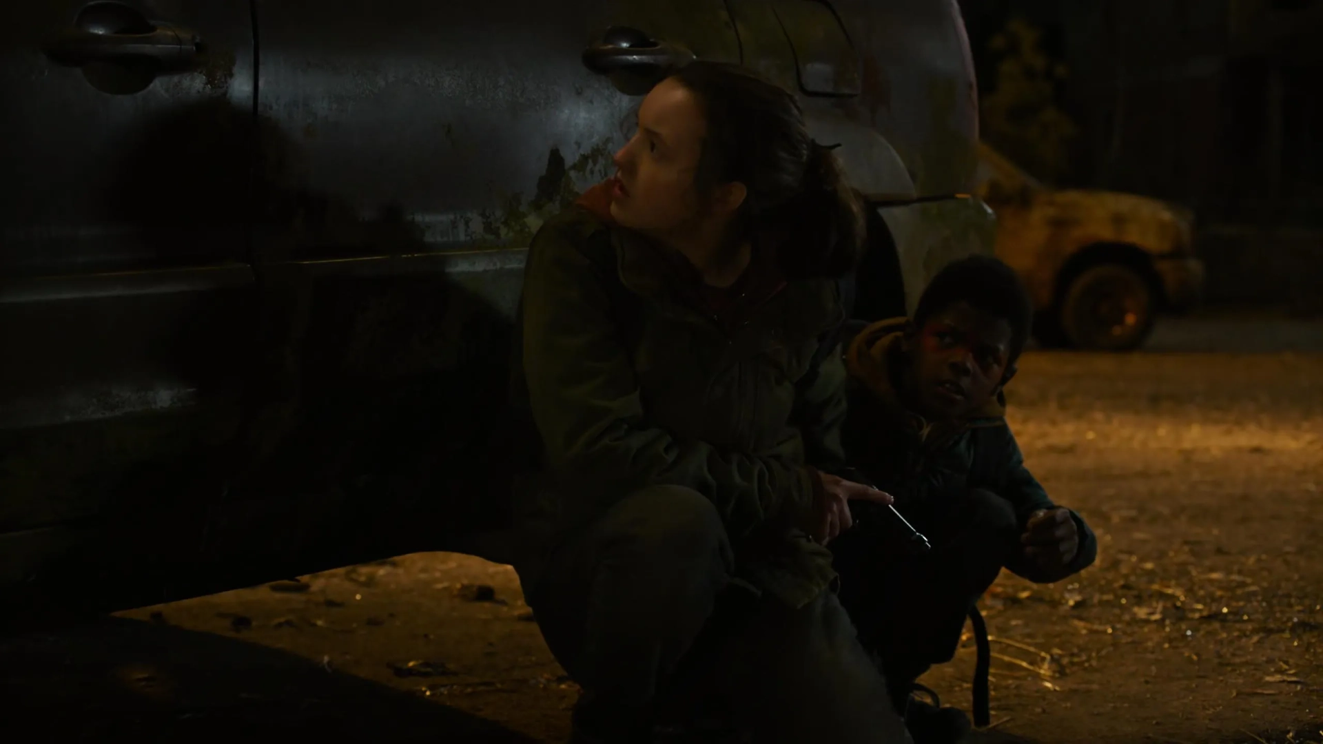 Keivonn Woodard and Bella Ramsey in The Last of Us: Endure and Survive (2023)