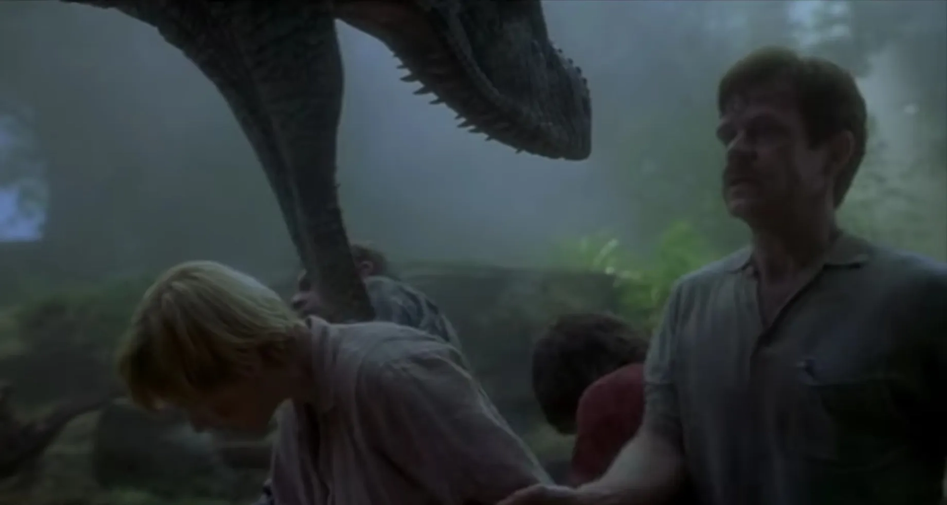 Téa Leoni, William H. Macy, Sam Neill, and Trevor Morgan in Jurassic Park III (2001)