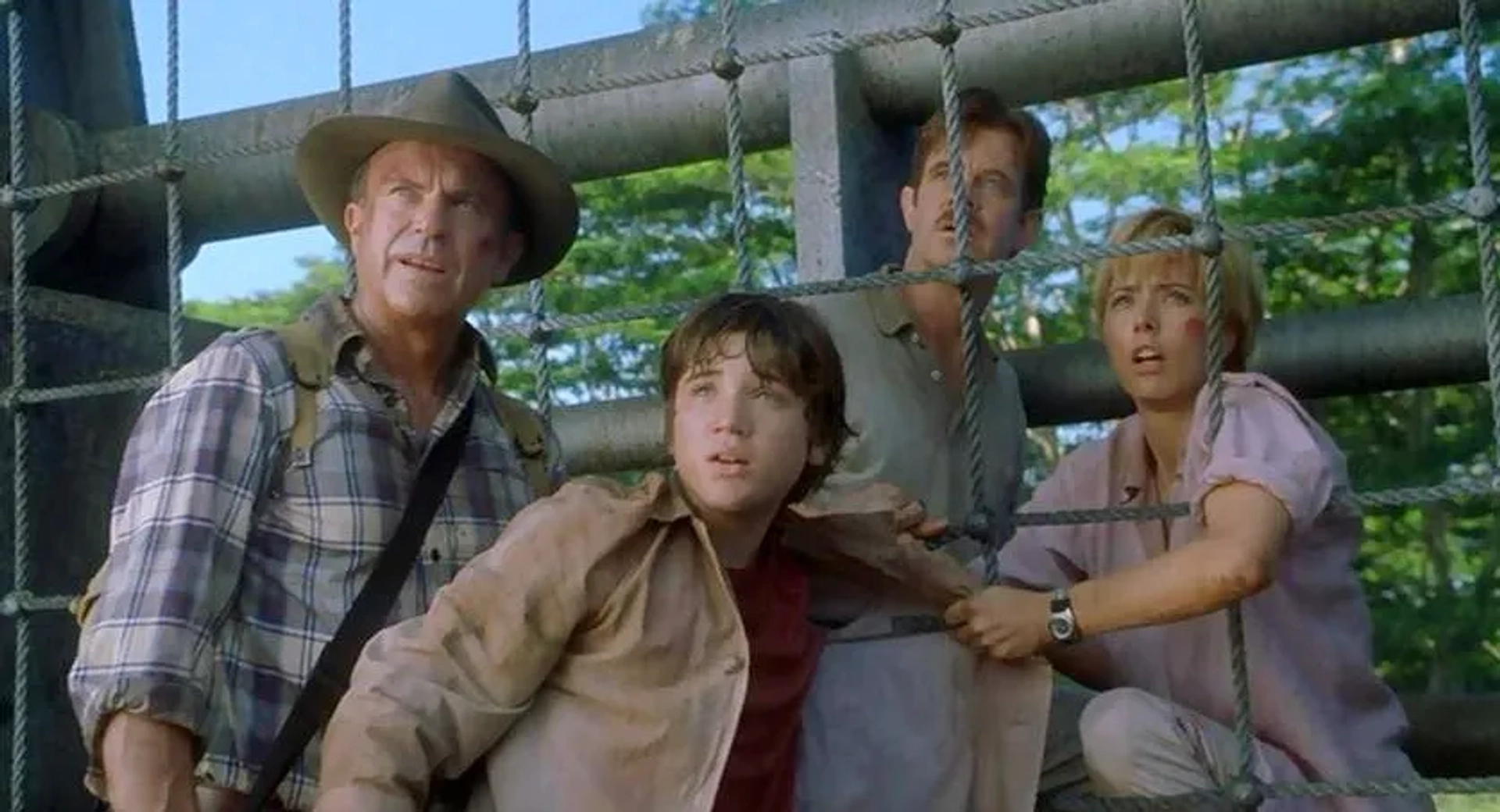 Téa Leoni, William H. Macy, Sam Neill, and Trevor Morgan in Jurassic Park III (2001)