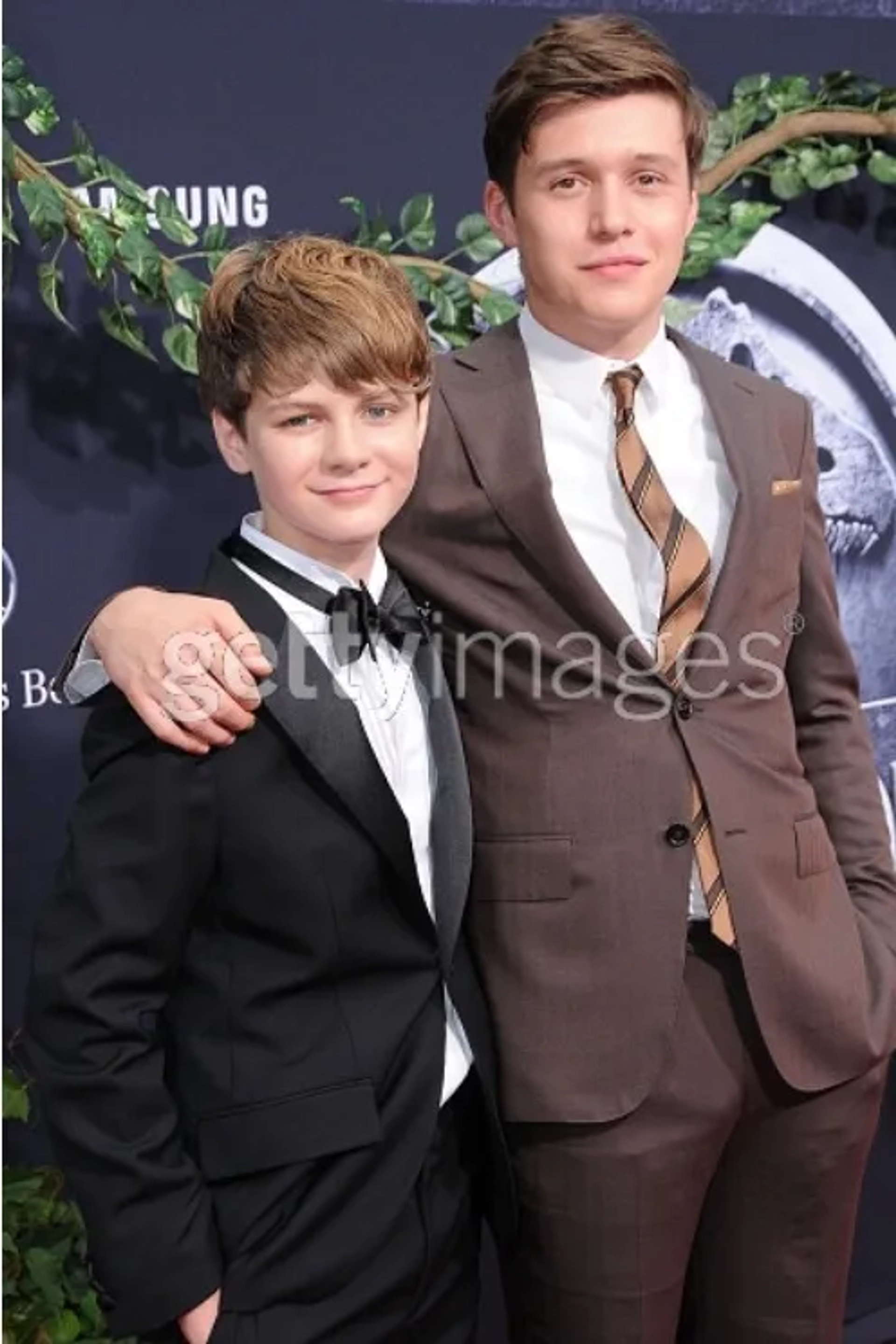 Ty Simpkins and Nick Robinson at an event for Jurassic World (2015)