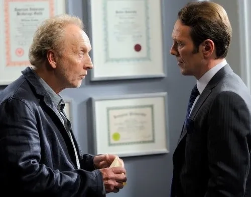 Tobin Bell and Peter Outerbridge in Saw VI (2009)