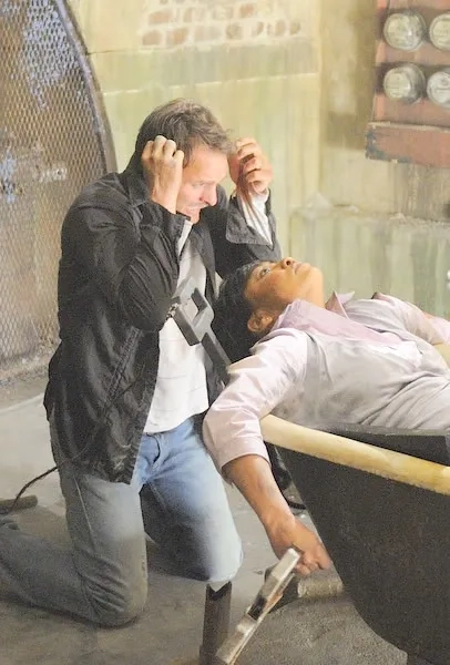 Greg Bryk and Meagan Good in Saw V (2008)