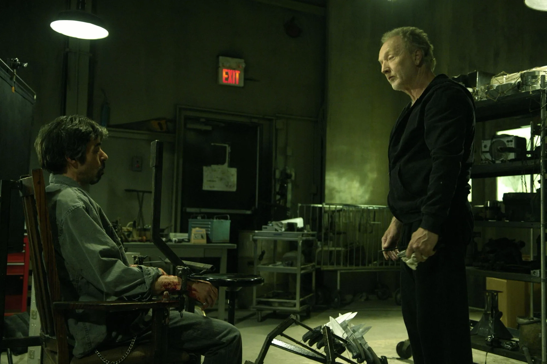 Tobin Bell and Billy Otis in Saw IV (2007)