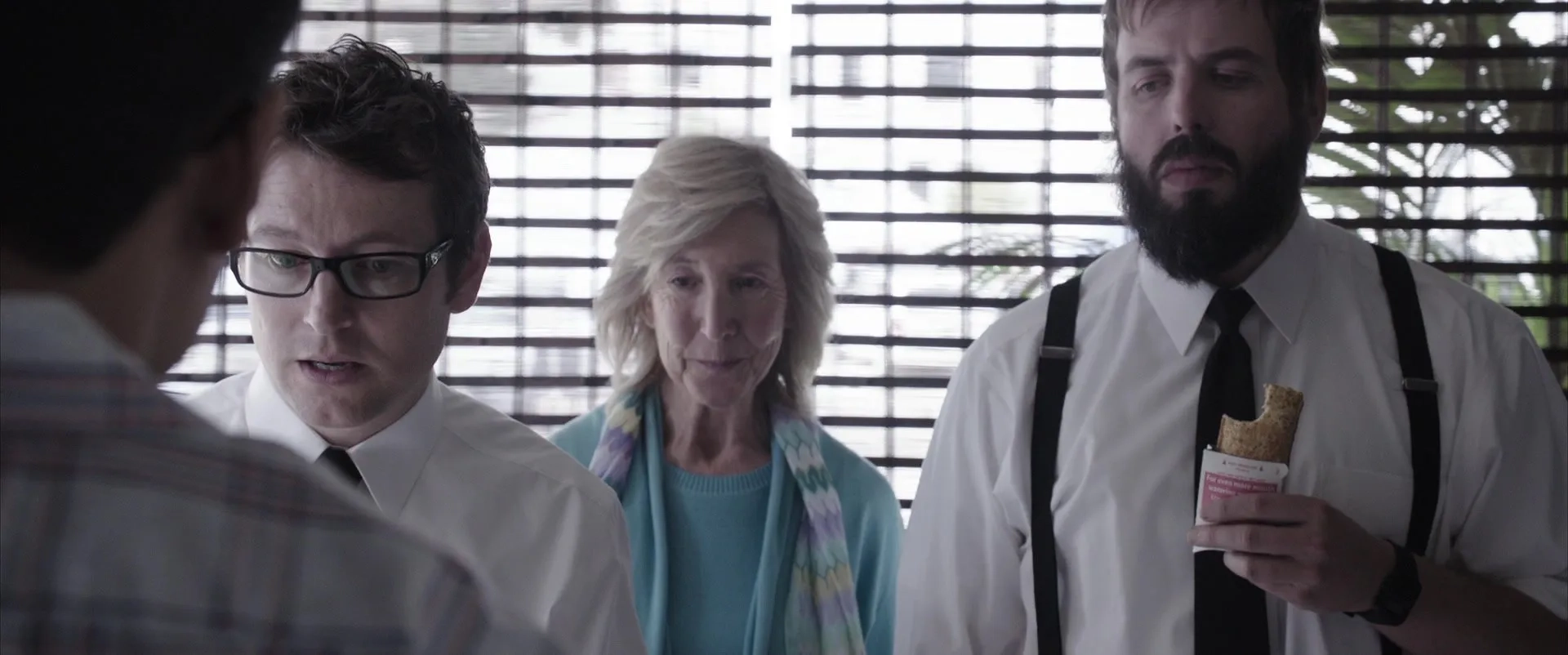 Lin Shaye, Angus Sampson, and Leigh Whannell in Insidious: Chapter 2 (2013)