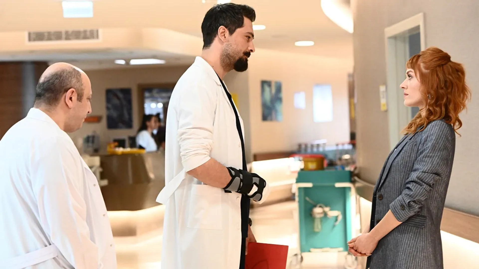 Serkan Keskin, Onur Tuna, and Hazal Türesan in A Miracle (2019)