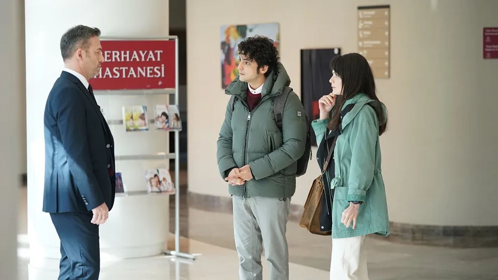 Taner Ölmez, Murat Aygen, and Sinem Ünsal in A Miracle (2019)