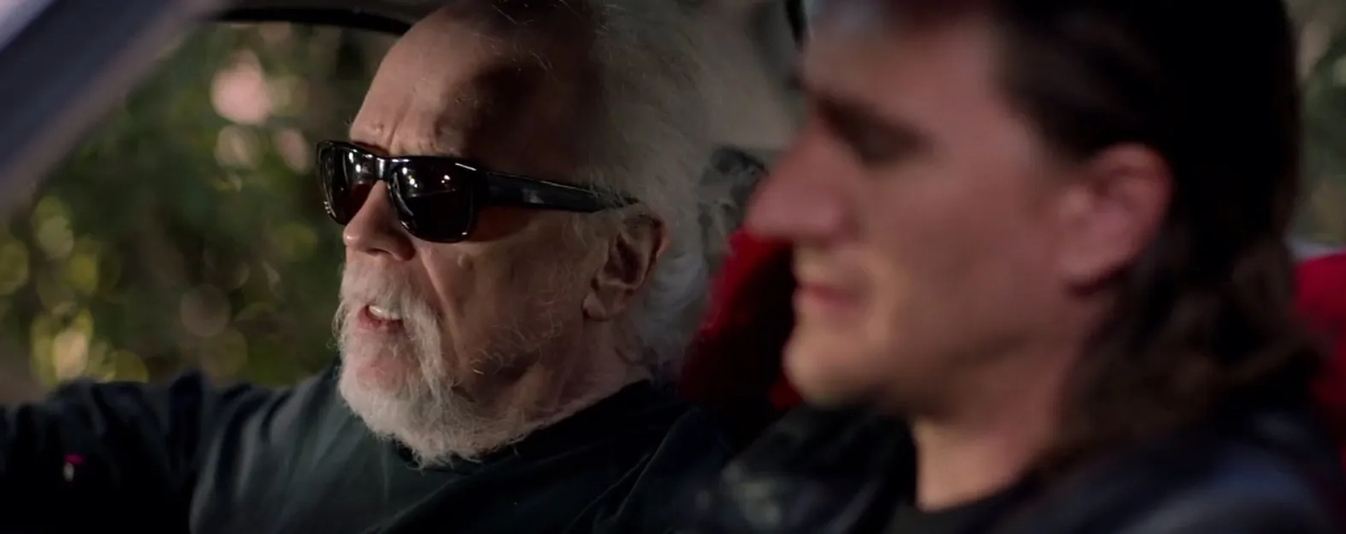 John Carpenter and Jason Trost in Studio 666 (2022)